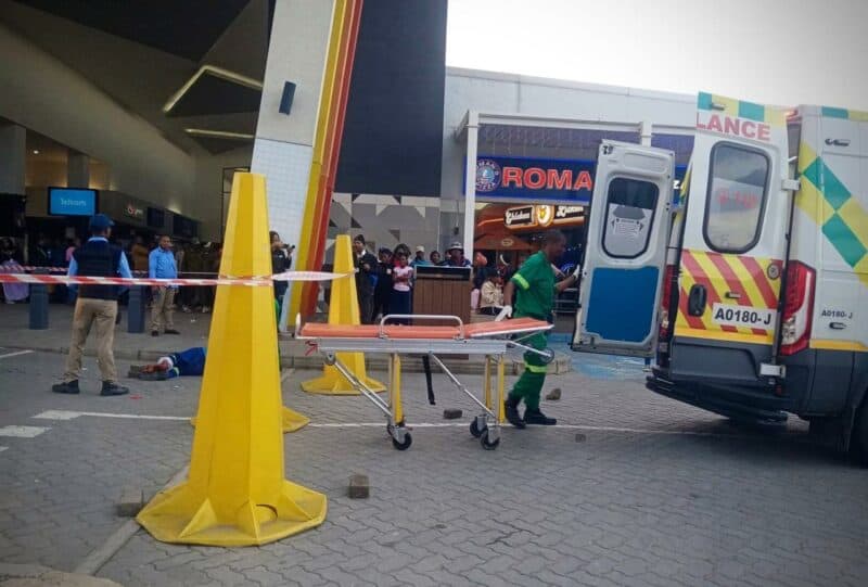 Police say the Fidelity Cash Solutions security guard who shot and injured a man at Alex Mall faces an attempted murder charge.