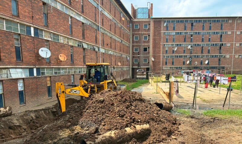 As the sewer reticulation project progresses, community leaders urge residents to support the upgrade and keep children away from construction zones.