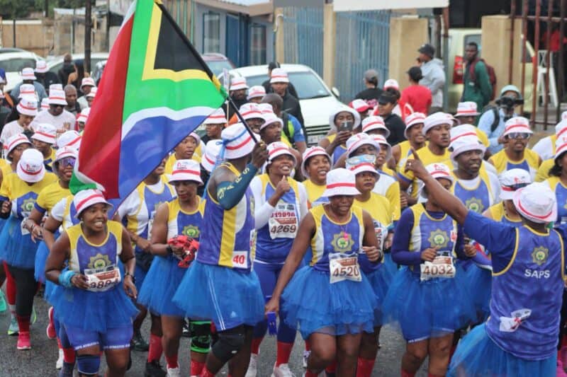 3 000 Alex 10k participants braved the pouring rain, pushing through steep slopes to tour Alexandra on foot.