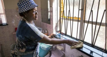 Lucy Mokhele carries out her physically demanding duties, which involve cleaning and cooking for her elderly employer and other family members in a private home in Johannesburg. Photo: Supplied