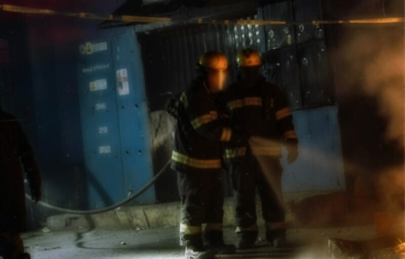 Gunshots rang out before residents uncovered the charred remains of three men in Alexandra.