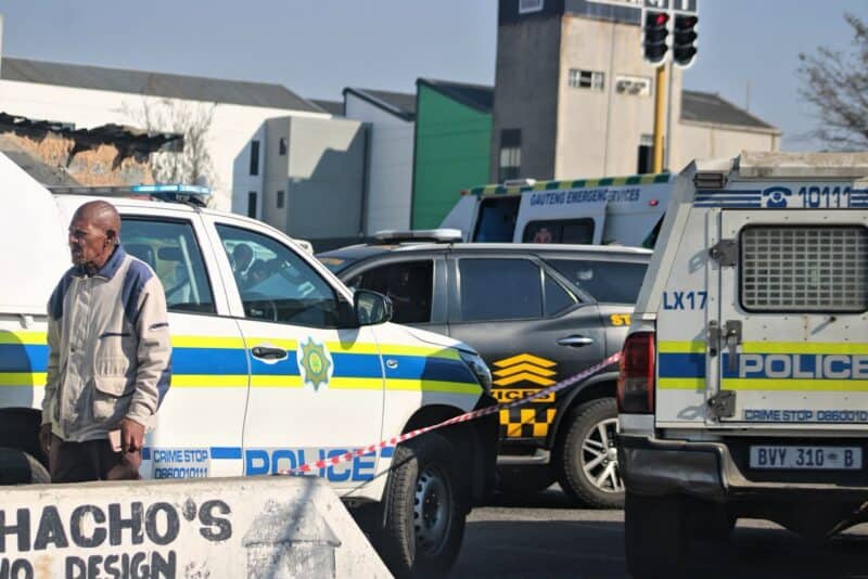 Police vehicles block Florence Mophosho Road following the alleged hijacking incident along the Pretoria Main Road on July 7, 2026. Photo: Itumeleng Maloka