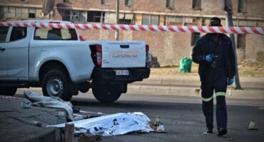 Police investigate a murder case after a man was discovered dead with gunshot wounds on his upper body in Alexandra on July 13, 2026. Photo: Itumeleng Maloka