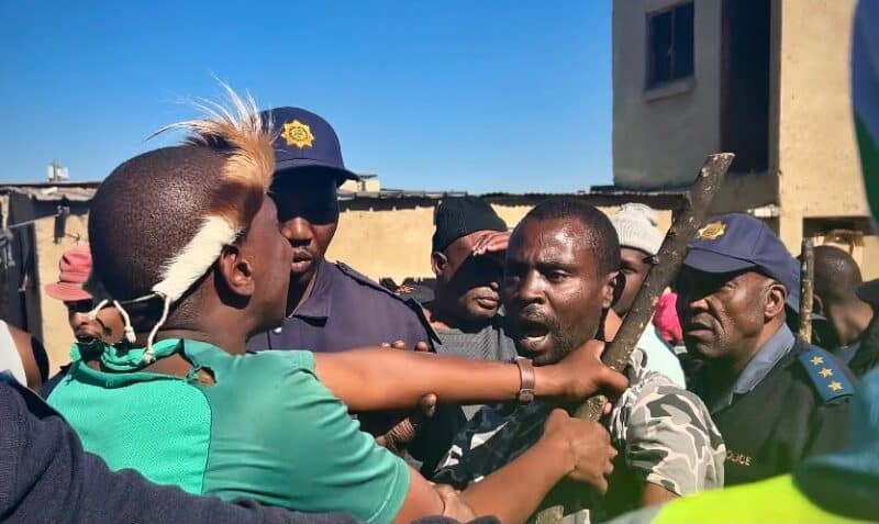 Police had to step in to rescue Tebogo Muhammad after he was assaulted and manhandled by anti-illegal immigration protesters in Marlboro.