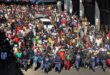 Police officers maintain walk ahead of scores of residents who decided to take it to the street to march against undocumented migrants iin Alexandra on June 30, 2026. Photo: Itumeleng Maloka