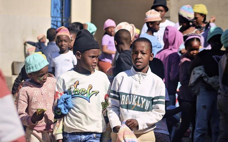 Children received reflective beanies that not only keep them warm but also keep them safe on the roads.