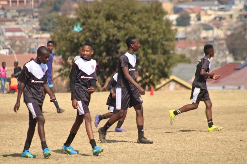 Alex Black Poison players return to their own half after scoring a goal against Amavulavala at Altrec Sports Complex in Alexandra on August 02, 2026.