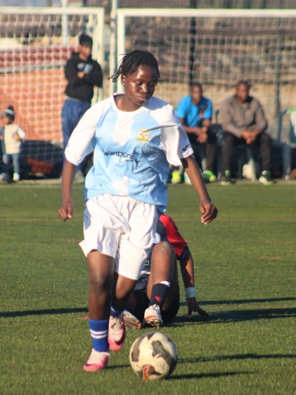 Blue Birds’ Tyhomfa Ongezo wins possession of ball and advances foward during their match against Mito Stars’ at the Alex Safe Hub on August 15, 2026.