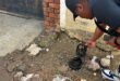 Ward 81 activist Theo Lengwati traces water trickling on Mapane Road to a leaking meter in River Park on August 31, 2026. Photo: Itumeleng Maloka