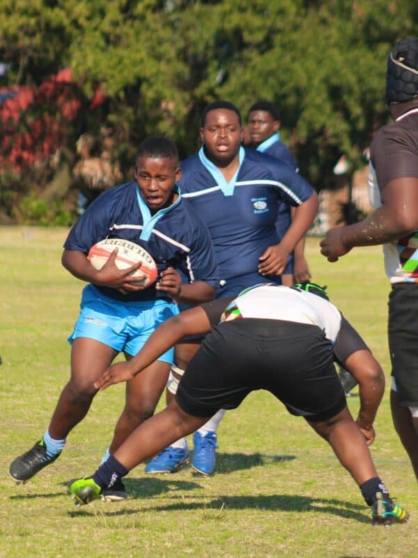 Alex Wolves’ Luthando Ndara pushes forward with the ball even as he is about to be tackled by a Harlequins players during their match at Ridgeway on September 12, 2026.