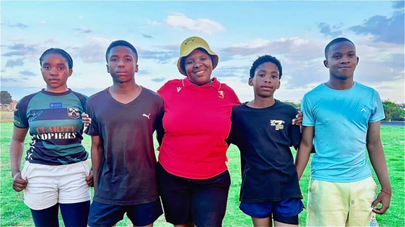 Young rugby players Ntombenhle Mpanza, Mangaliso Xiba, Coach Sarah Skhosana, Thandokuhle chophiso, and Siyabonga kubeka at Kwabhekilanga Sports Ground in Alexandra on October 15. Photo: Itumeleng Maloka