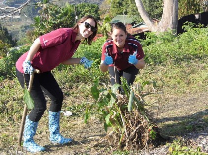 GRADE 2 teachers, Miss Middlebrook and Miss Pole lend a helping hand.