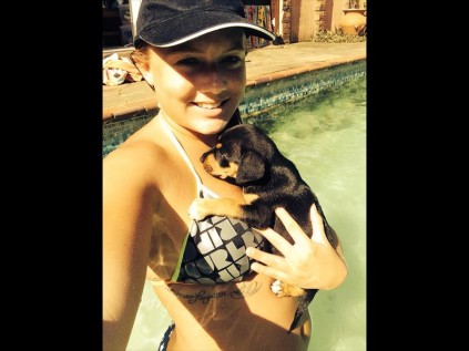 Tayla Pierrot with one of the pups they rescued last week.