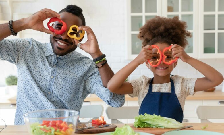 Portrait,Of,Overjoyed,African,American,Young,Dad,And,Little,Daughter
