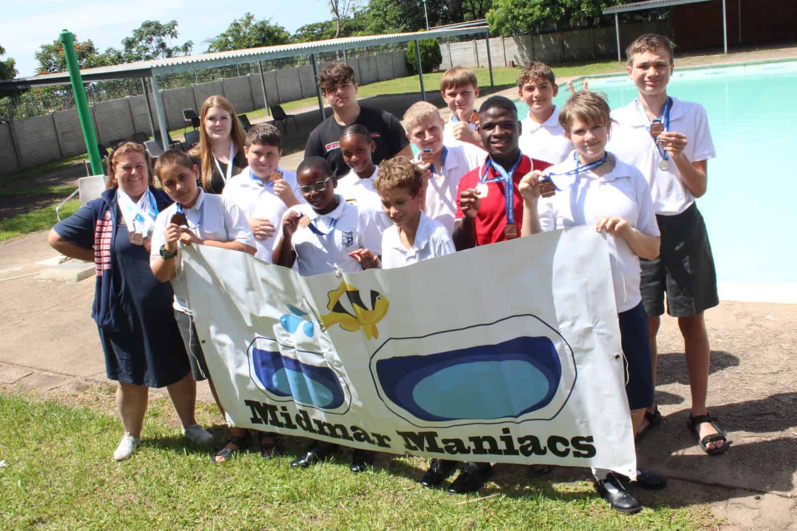 Educator helps special needs children swim the Midmar Mile