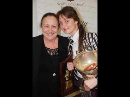 NGHS Head of Music is pictured with Gillean Fraser who won both the music theory and practical awards as well as the English award.