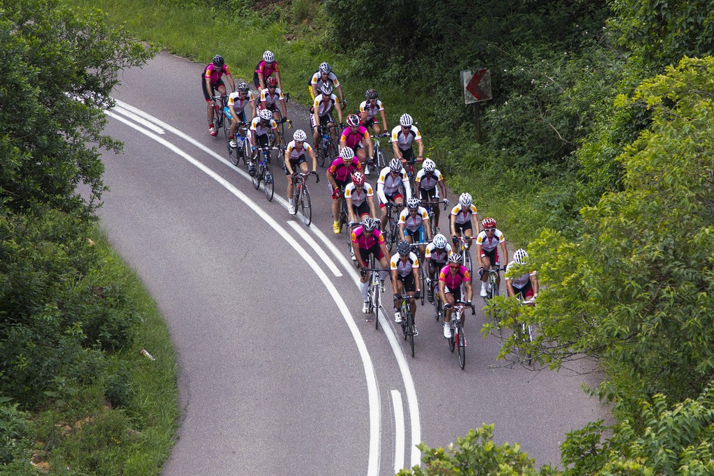 Endurance. Cyclists in a tight peleton round a bend approaching Durban during the challenging Ride for RedCap which raised over R75 000 for the RedCap Foundation. PHOTO: Pierre Tostee (RedCap Foundation Communications)