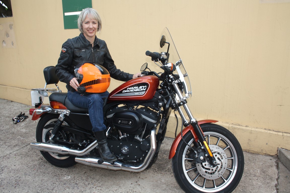 Biker chic, Brenda Daniels on her Harley.