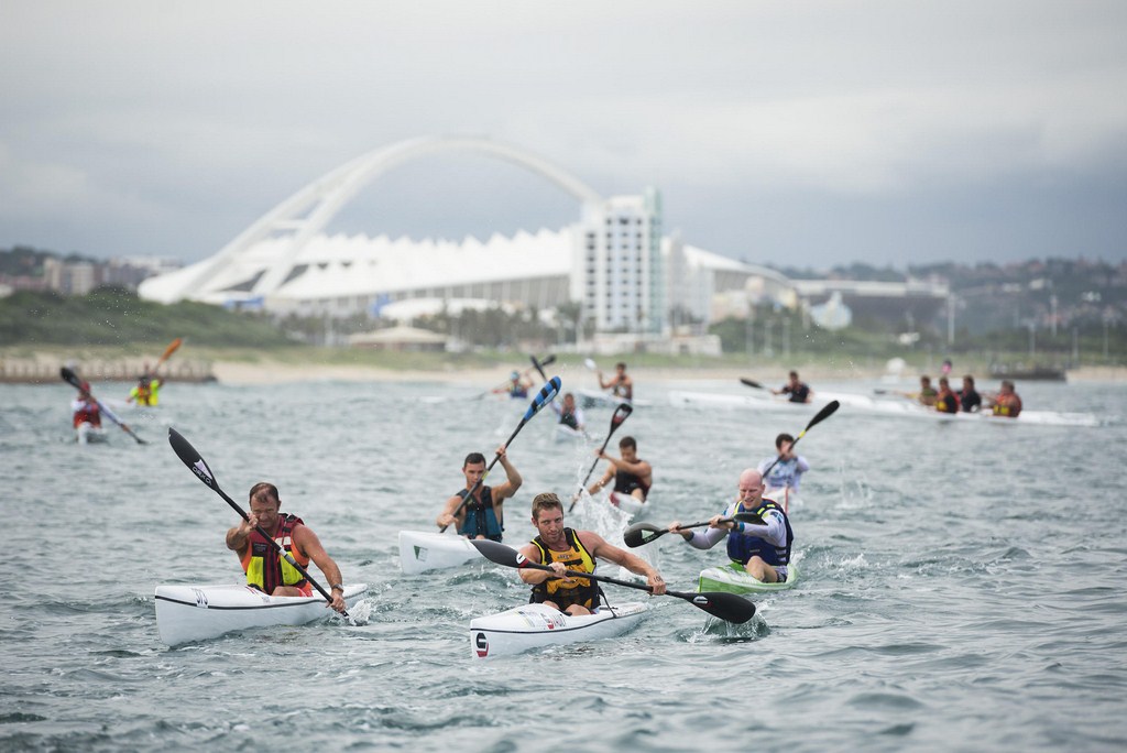 Australia's James Morfitt (centre) leads Billy Harker (left) and a group of local paddlers back from their leg down towards the iconic Moses Mabhida stadium in the Thule Surfski Challenge, race four of the 2014 Varsity College Marine Surfski Series. PHOTO: Anthony Grote (Gameplan Media)