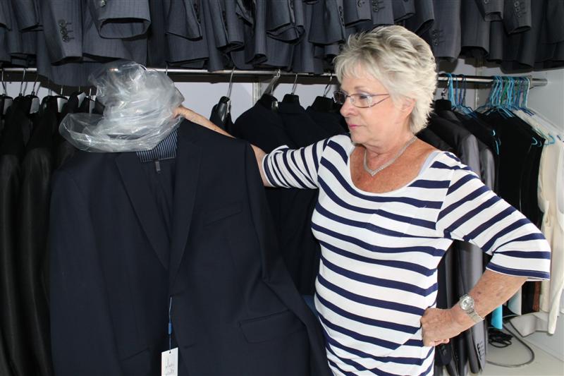 Lynda Heystek with a replica of the suit that was stolen.