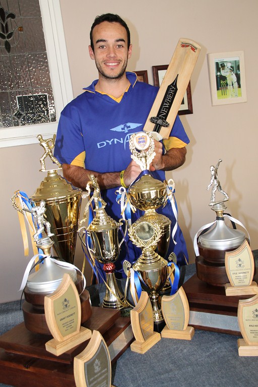 Durban North cricket star Kyle Hodnett, shows off all the silverware both he and his brother, Grant, have won over the years.