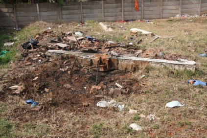 The remains of the original house which was knocked down to get rid of a family who had stopped paying rent and claimed squatters rights.