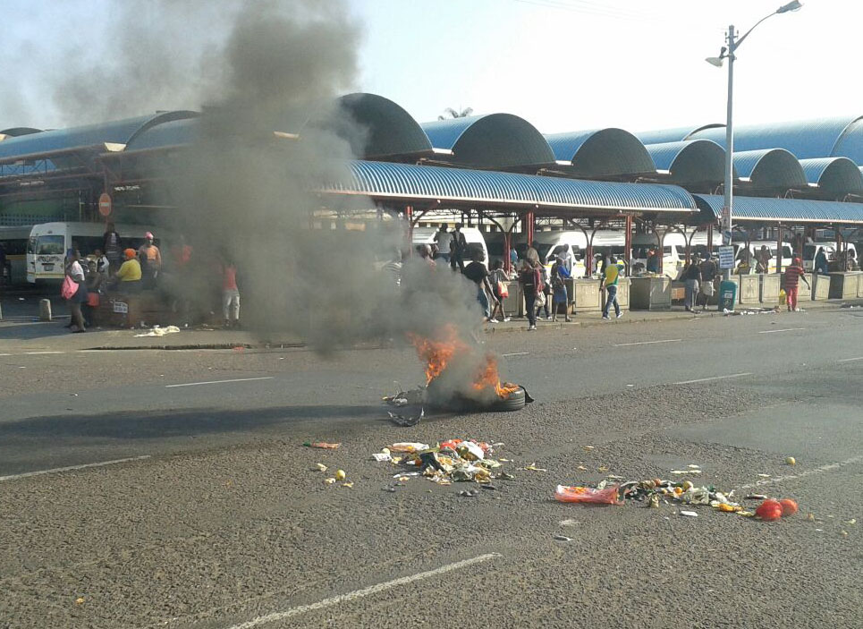 Taxi drivers have burned tyres and allegedly stoned cars. PHOTO: Berea Mail