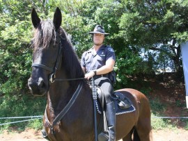 Inspector Micheal Mooney and Eli from the Mounted Police Unit.