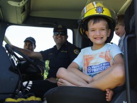 Noah Petzer got to sit in one of the fire engines with the sirens on.