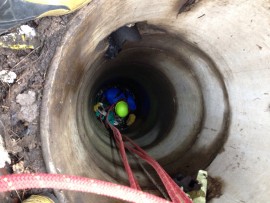 Inspector Moloi was lowered into the five meter deep drain using a special crane from the Durban North Fire Department.