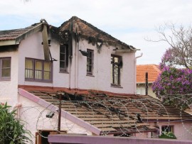 Firefighters couldn't enter the home because parts of the home was structurally unsafe.