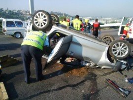 Paramedics treat several people injured in a crash on the N2 this morning. Photo: RUSA