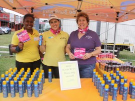 Cancer Association of South Africa (CANSA) members, Mandisa Mthembu, Cara Noble and Linda Cipolla packed more than 17 000 goodies bags for the entrants in the race.