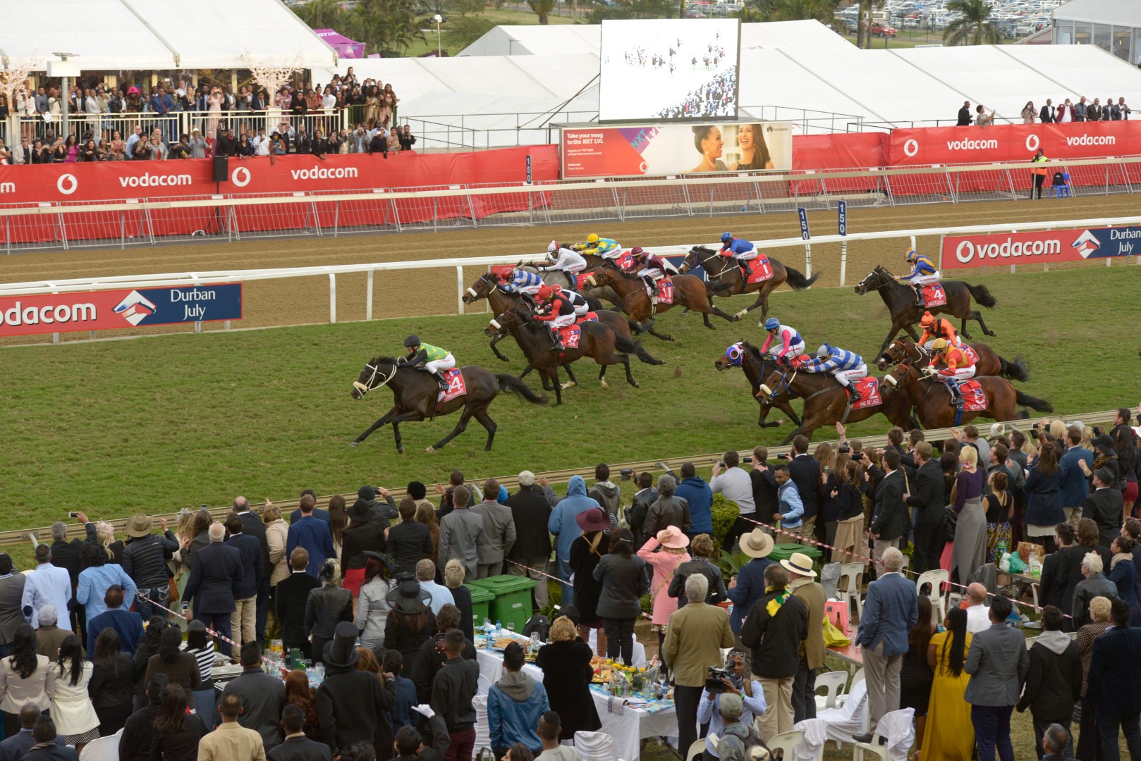 The Conglomerate (front), ridden by Piere Strydom, fought off the rest of the field to claim the prestigious 2016 Vodacom Durban July title at Greyville Racecourse on Saturday, 2 July. PHOTO: Anthony Grote (Gameplan Media)