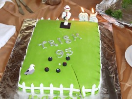 RIGHT: The club organised a special cake for Trish on her 95th birthday.