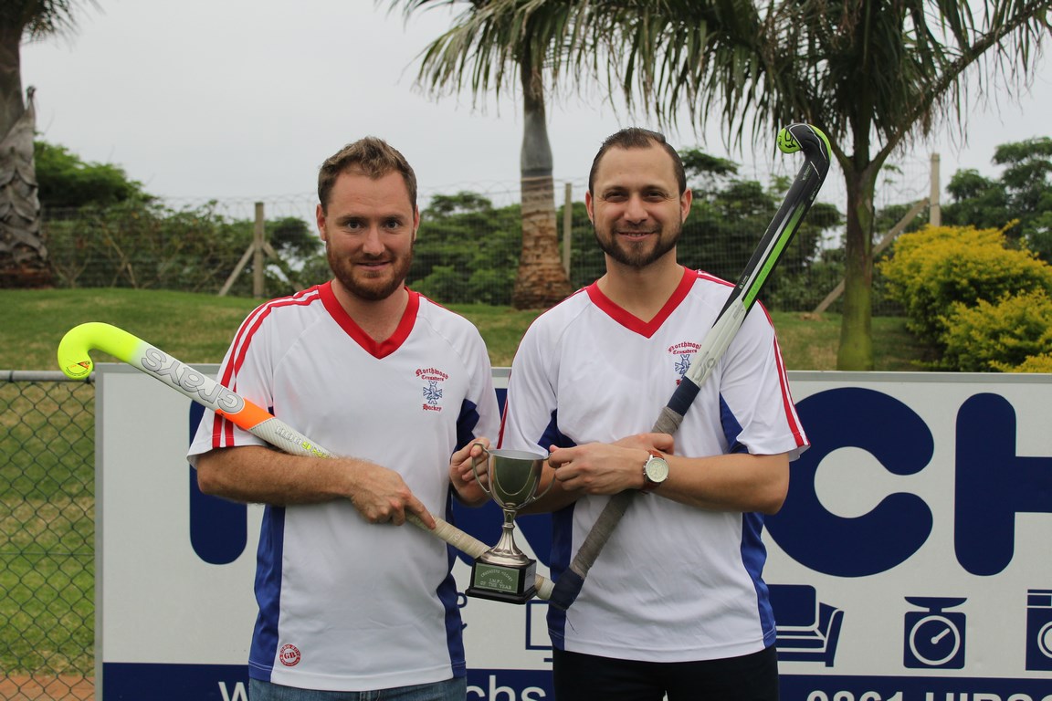 Duncan Ogilvie and Shaun Davenhill who ended up the team's top scorer celebrate being promoted into the KZN Premier Hockey league.
