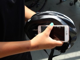 The local cyclist shows some of the items damaged in the accident.