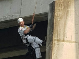 Rescue workers lowered the man from the top of the bridge. PHOTOS: Rescue Care