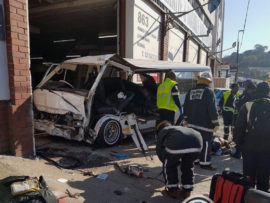 The taxi crashed into a business after colliding with the three vehicles.