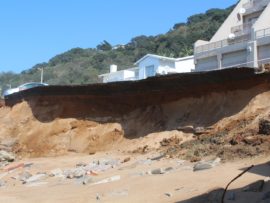 Sand eroding underneath the road