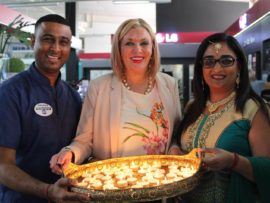 Denver Naicker, Margaret Hirsch and Vino Govender in good spirits of Diwali celebrations.