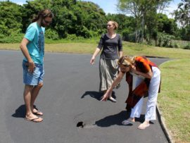 Damien Cope, Farrah Stegen and Linda McGregor examine a secondary sinkhole which has formed on Michel Avenue.