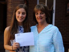 Rachel Springate had 7As which included 92% for Geography (which placed her in the top 1% in the country) and 95% for maths. She is congratulate by principal Dee Horsfall.