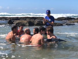 THE actions of several members of the Umhlanga Rocks Surf Lifesaving Club (URSLC), NSRI, Ushaka Marine World and other roleplayers have been praised after they saved a young spinner dolphin which had become trapped on the rocks on uMhlanga main beach on Sunday. Speaking to Northglen News, URSLC member Declan Bradfield, explained the dolphin had first been spotted by senior lifesaving club member Derek Morris. "We were training as we normally do on Sunday when Derek (Morris) spotted the dolphin struggling to the right of grannies pool. When we got out to him he had a few cuts on his head and it was far too rocky to try and gain any footing to help the dolphin, so we moved him over to Grannies pool. We supported his head and kept the blowhole at the surface. "Several people had contacted members of Ushaka Marine World and the KZN Marine Animal Stranding Network who came out to assist. We were probably in the water for three hours and we could see the pod of dolphins he belonged to hanging around because they knew something was wrong. Initially he wasn't looking great and he wasn't trashing or moving. We then contacted a dolphin charter boat to help move the youngster," Bradfield explained. The spinner dolphin was placed on a spinal board and the boat took the resucers along with the mammal out to sea. "Once we reached the backline I, along with others dived into the water, and helped the dolphin. He took a few moments to acclimatise and then, with no frills or fuss, he just swam off. It was such a sweet feeling seeing him swim off like that. I think everyone involved in the rescue deserves praise because it was great to see the community and rescuers rally around the dolphin," he said. NSRI spokesman, Craig Lambinon said once out at sea, rescuers assisted with doing the float and swim tests with the dolphin to make sure it was all clear to be released. "Once released the dolphin appeared to take a few moments to acclimatise following the boat ride but soon appeared to swim away strongly towards a dolphin pod," he said.