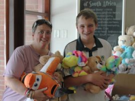 Tracy Crocker and Mitchell Slade with some of the toys donated on the day.