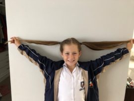 The 9-year-old grew hair for more than a year before making the cut.