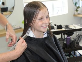 Abby sports her new cut. She had her hair cut at Gaynor Hair on Broadway.