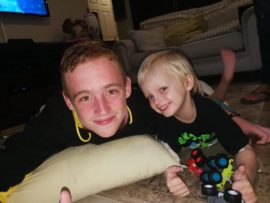 Josh Crocker with Sammy Jones before the freak accident. The youngster is swimming the Midmar Mile in order to raise funds for the Jones family.