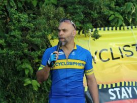Greg Albert addressed the crowd of cyclists attending the memorial ride.