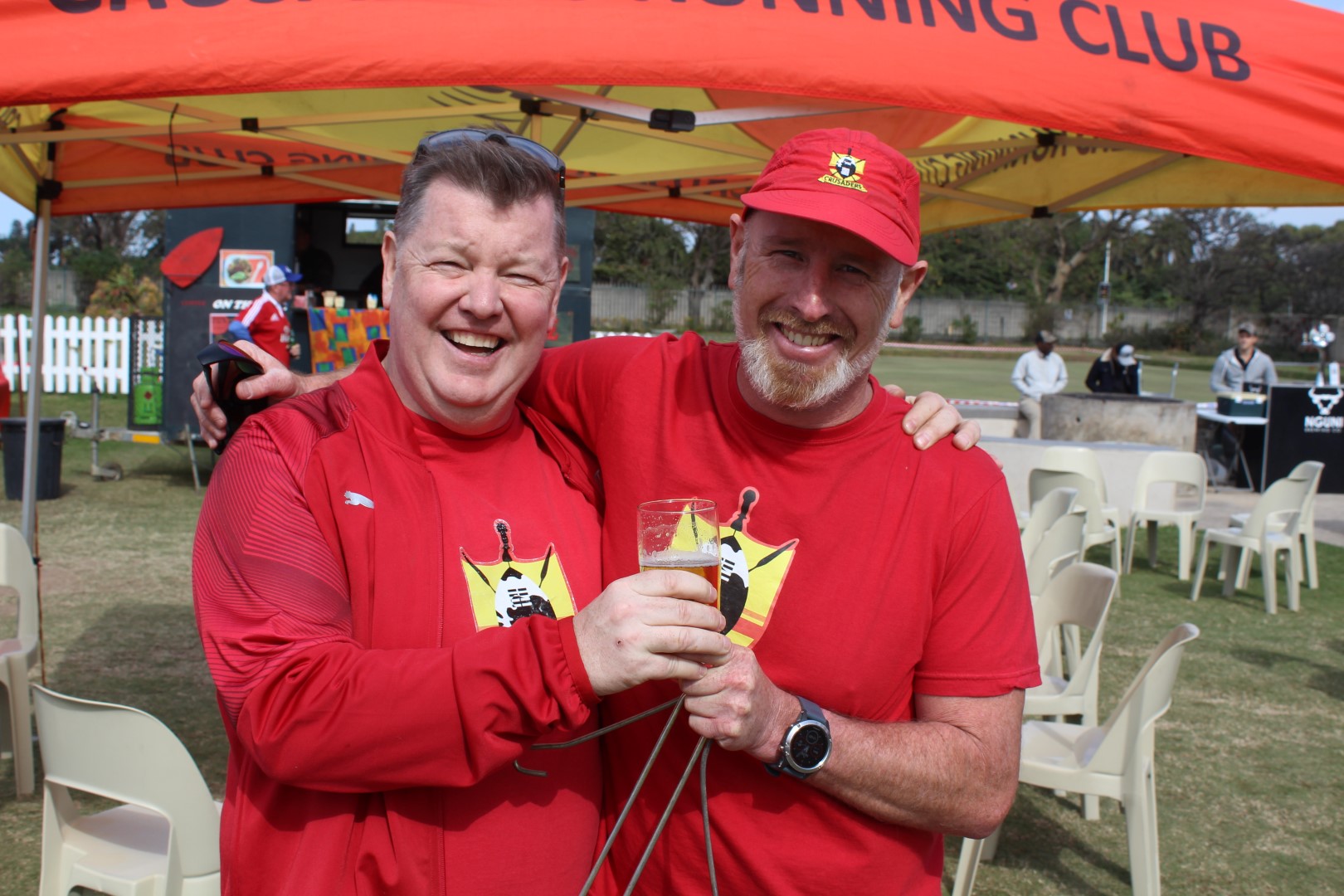 Crusaders Running Club members, Tom Carey and chairman, Mark Reeves.